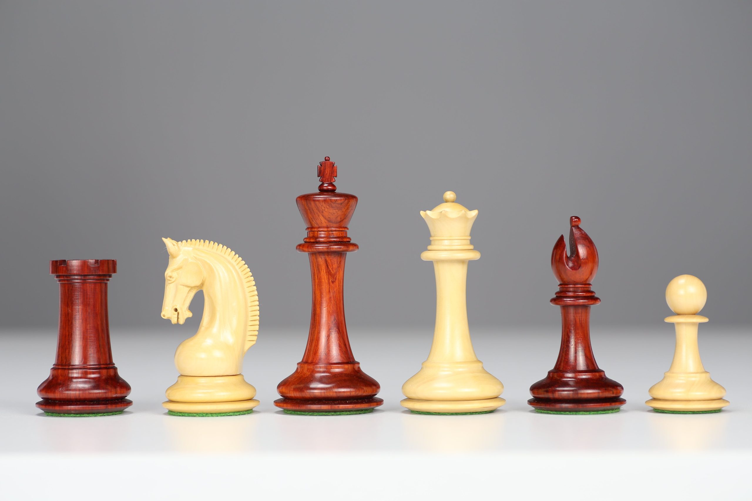 4.5″ Padauk Red Rum Design Chessmen